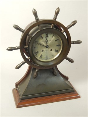 Lot 11 A Goldsmiths & Silversmiths Company ship's bell maritime clock