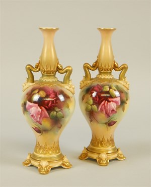 Lot4 A pair of Royal Worcester porcelain two handled vases