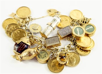 Lot1 A 9ct gold and gold curb link charm bracelet with nine gold sovereigns and two gold half sovereigns