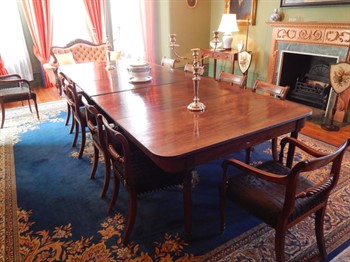 555 A George III mahogany extending dining table