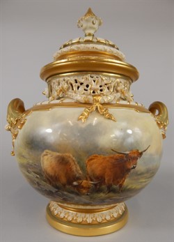 1236 A Royal Worcester two handled vase and cover, of squat ovoid form, painted with highland cattle in a landscape by John Stinton